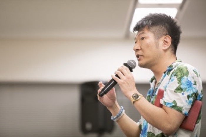 講演する鈴木正行